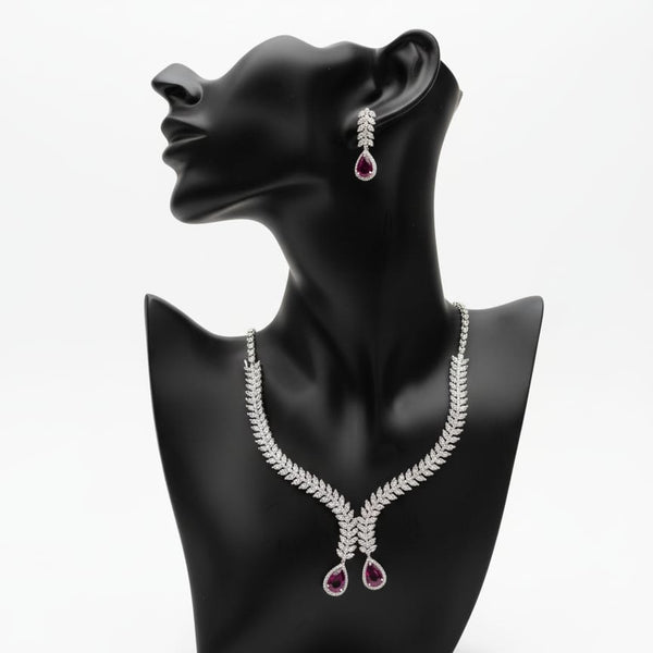 Classic Beauty Meets Ruby Red Shine With Earrings