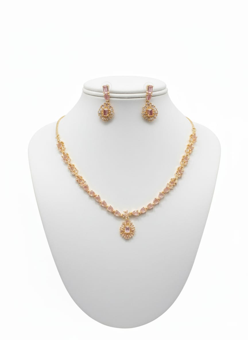 Ringing Jewels Golden Colour with Pink Stones Single Layer "AD" Necklace Set With Earrings