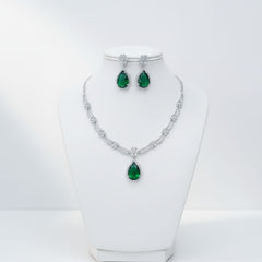 Ringing Jewels White Colour with Green Bold Stone 
