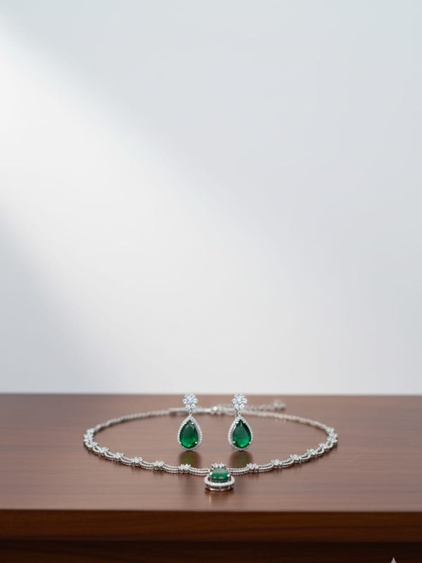 Ringing Jewels White Colour with Green Bold Stone 