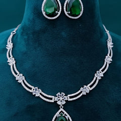 Ringing Jewels White Colour with Green Bold Stone 