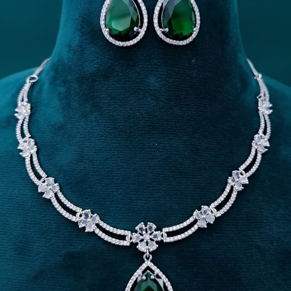 Ringing Jewels White Colour with Green Bold Stone 