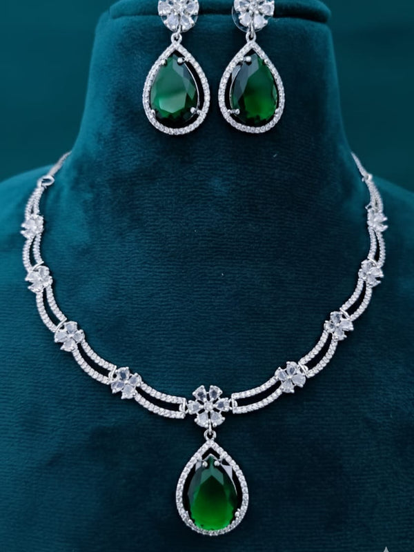 Ringing Jewels White Colour with Green Bold Stone 